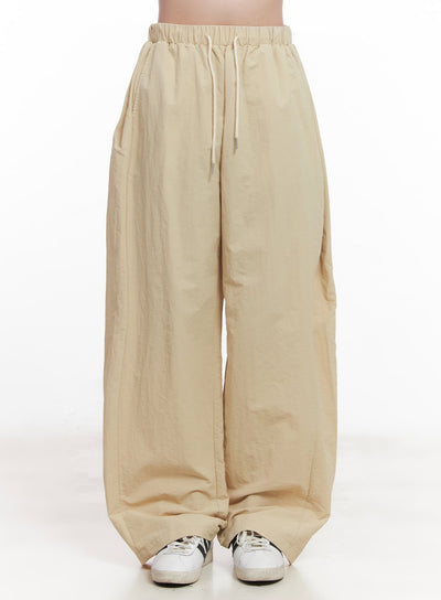 pintuck-wide-fit-windbreaker-pants-cy523 / Beige