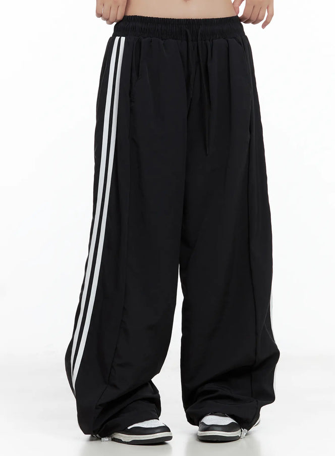 striped-wide-leg-nylon-track-pants-cl509 / Black