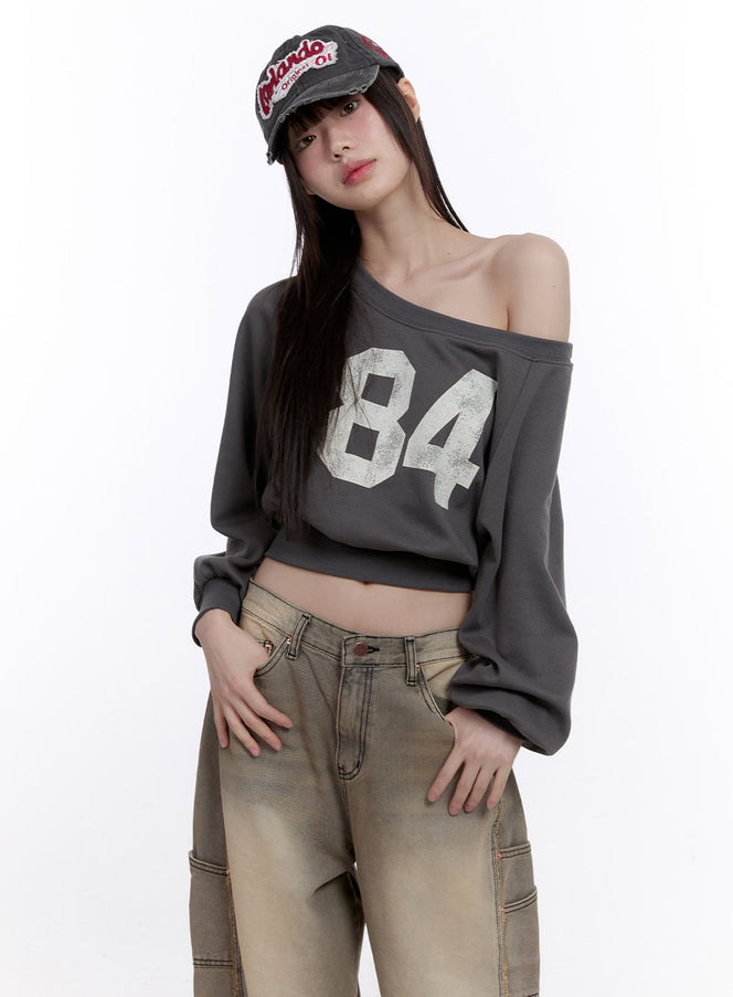 84 Graphic One-Shoulder Cropped Sweatshirt CF512