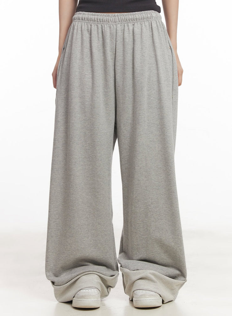 stud-roll-up-wide-fit-sweatpants-ca529 / Gray