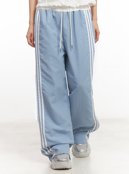 striped-nylon-track-pants-ia525 / Light blue