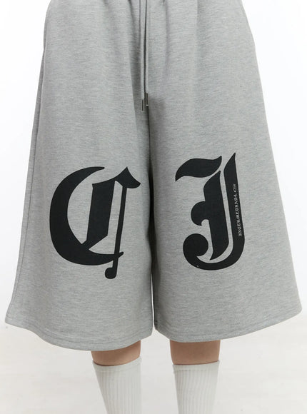 Gothic Lettering Oversized Shorts CA506
