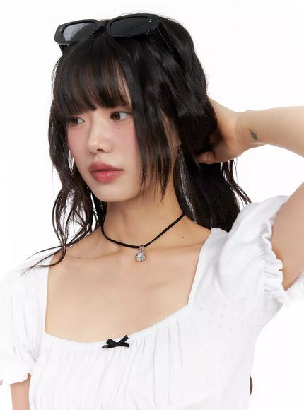 acc-onkapo-teddy-with-a-ball-black-cord-necklace-cg507