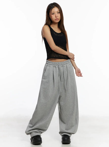 studded-cross-baggy-sweatpants-iy501