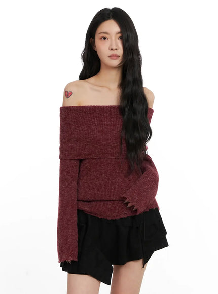 distressed-off-shoulder-sweater-in528