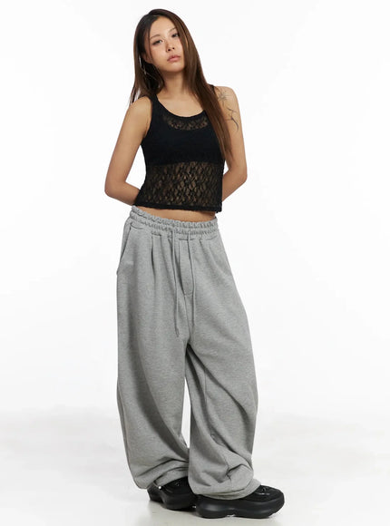 studded-cross-baggy-sweatpants-iy501