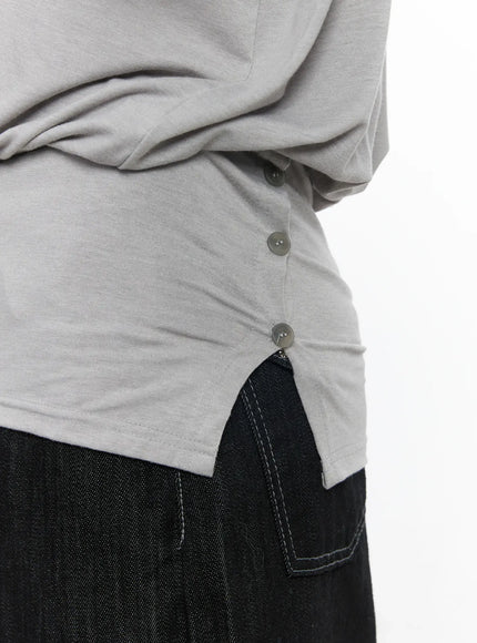 asymmetric-button-detail-off-shoulder-long-sleeve-top-cj530