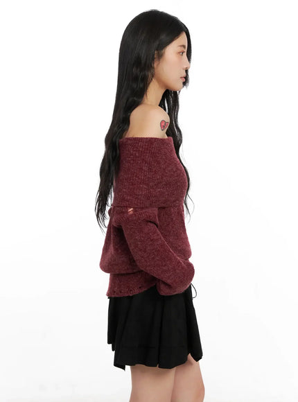 distressed-off-shoulder-sweater-in528