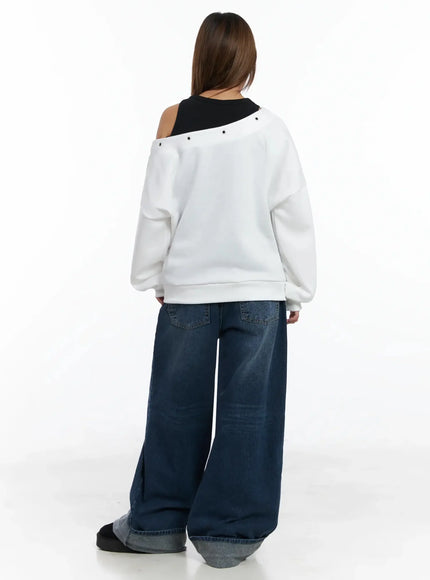 off-shoulder-eyelet-graphic-sweater-in528