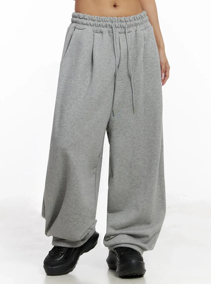 studded-cross-baggy-sweatpants-iy501