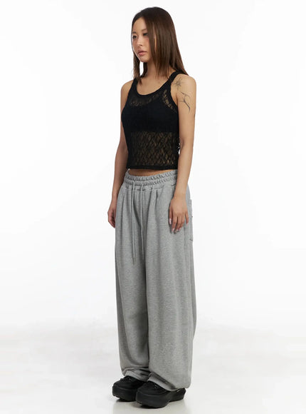 studded-cross-baggy-sweatpants-iy501