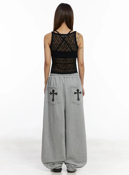 studded-cross-baggy-sweatpants-iy501
