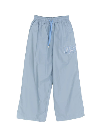 mens-09-graphic-nylon-drawstring-pants-im503