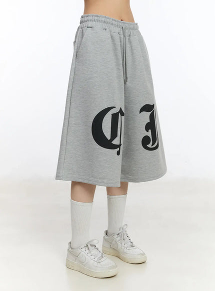 Gothic Lettering Oversized Shorts CA506