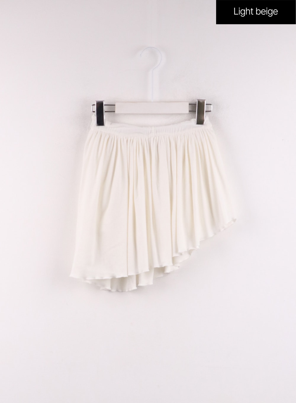 asymmetrical-frill-mini-skirt-cf405 / Light beige