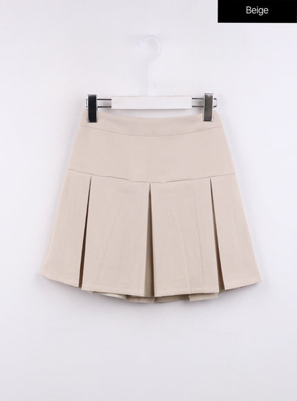 solid-pleated-mini-skirt-cj425 / Beige